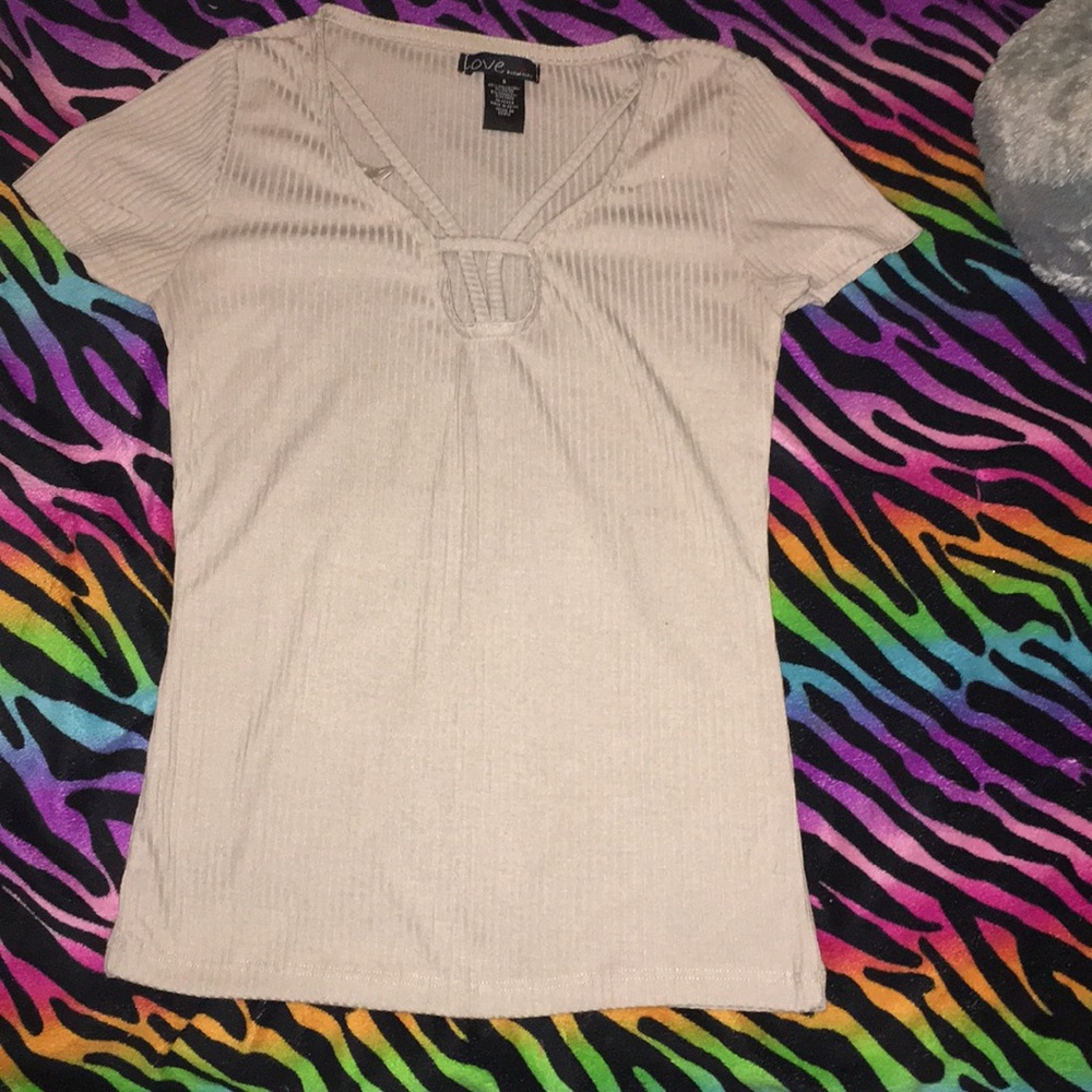 A beige dressy blouse from citi trends